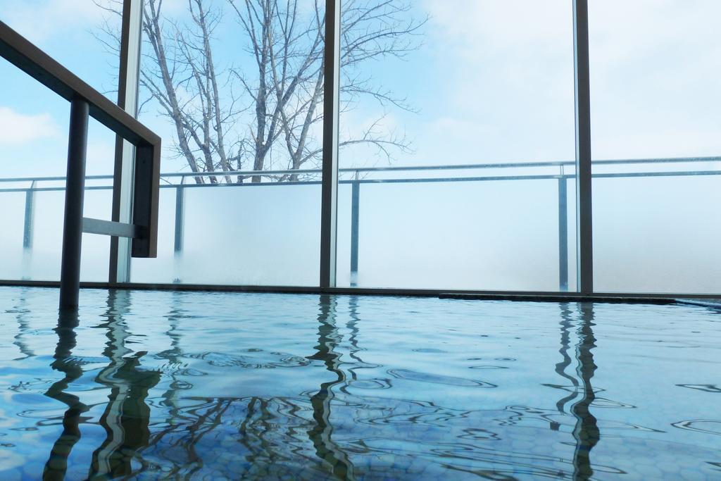 Shin Furano Prince Hotel מראה חיצוני תמונה A view of the indoor pool